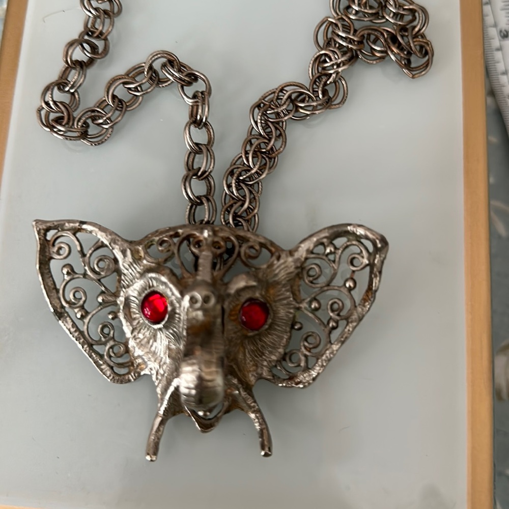 Large elephant head 🐘 trunk up red eyes Juliana